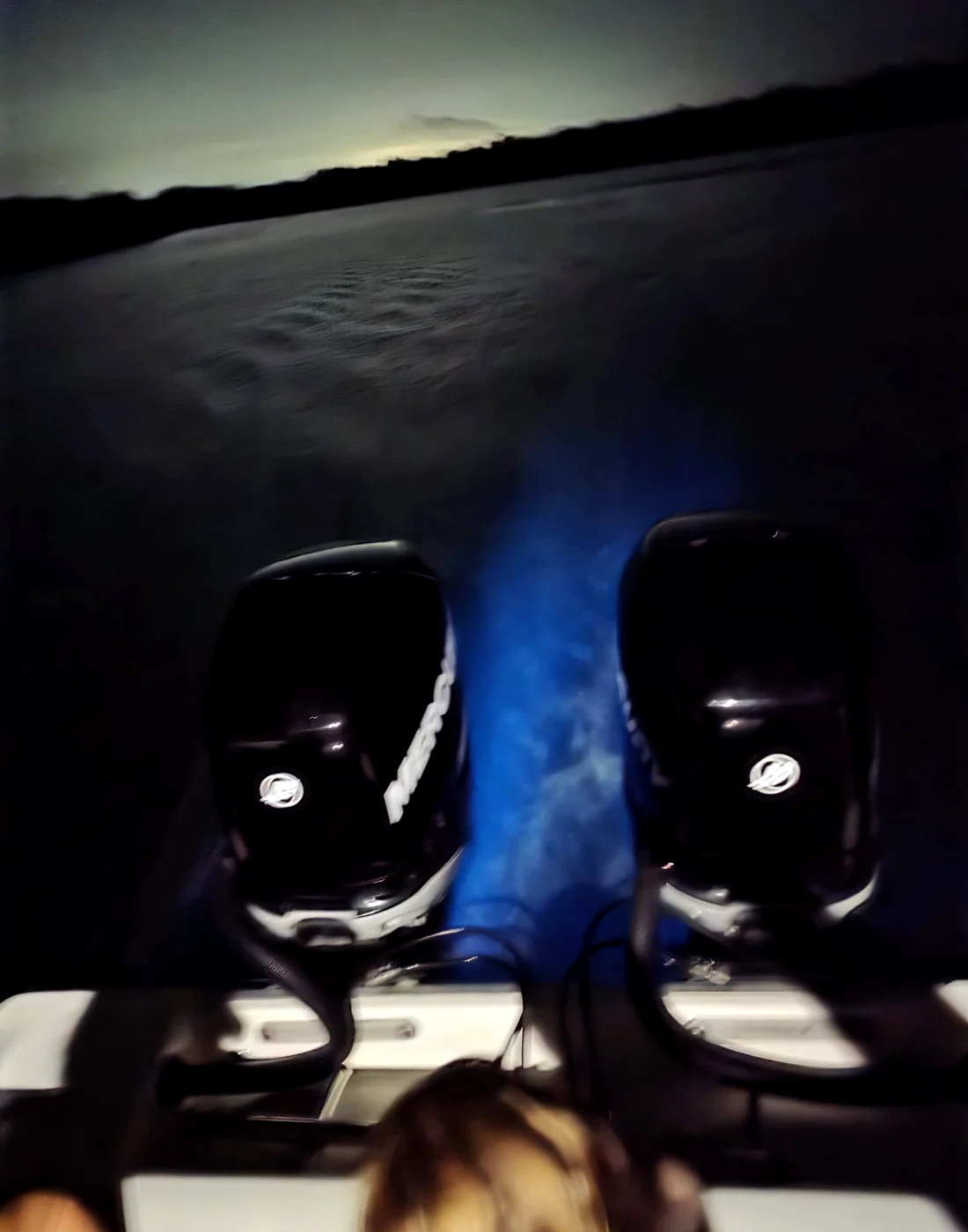 Bioluminescent wake behind the boat