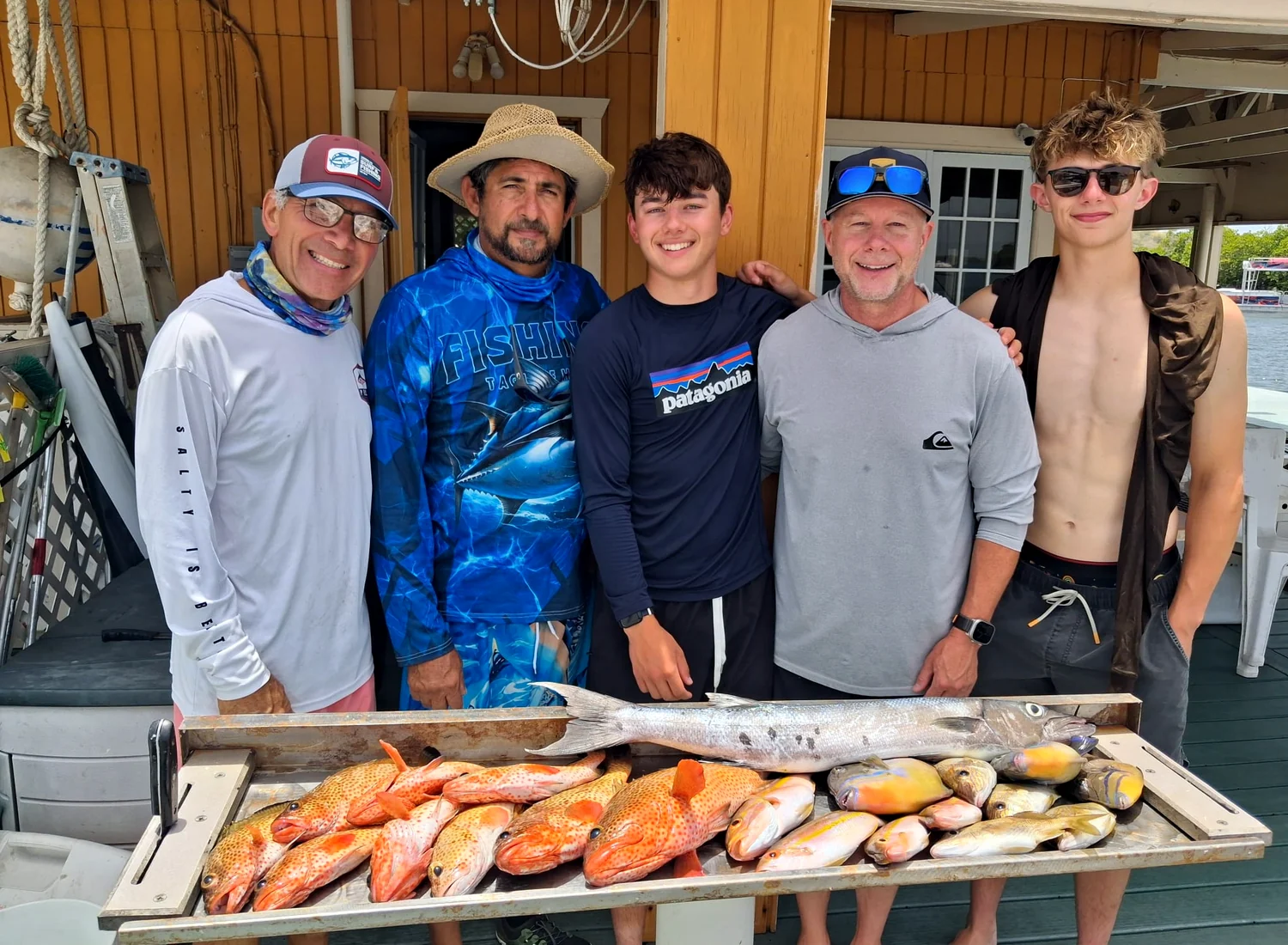 A group back at the dock with the day’s catch